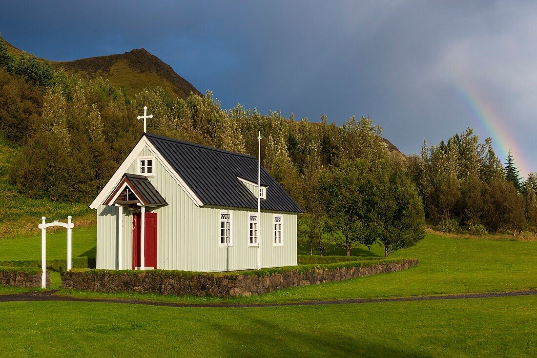 Iceland, Sudurland, Skogar, Skogar Museum, church, rainbow