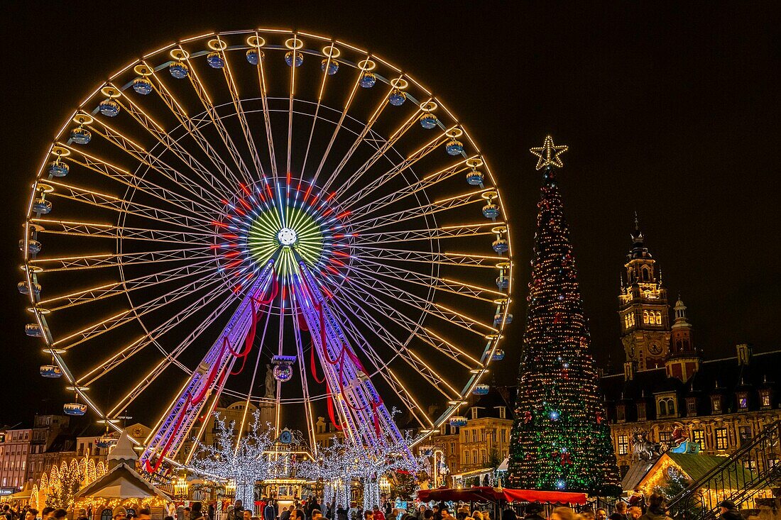 France, Nord, Lille, the Ferris wheel and Christmas lights on the Place du General de Gaulle