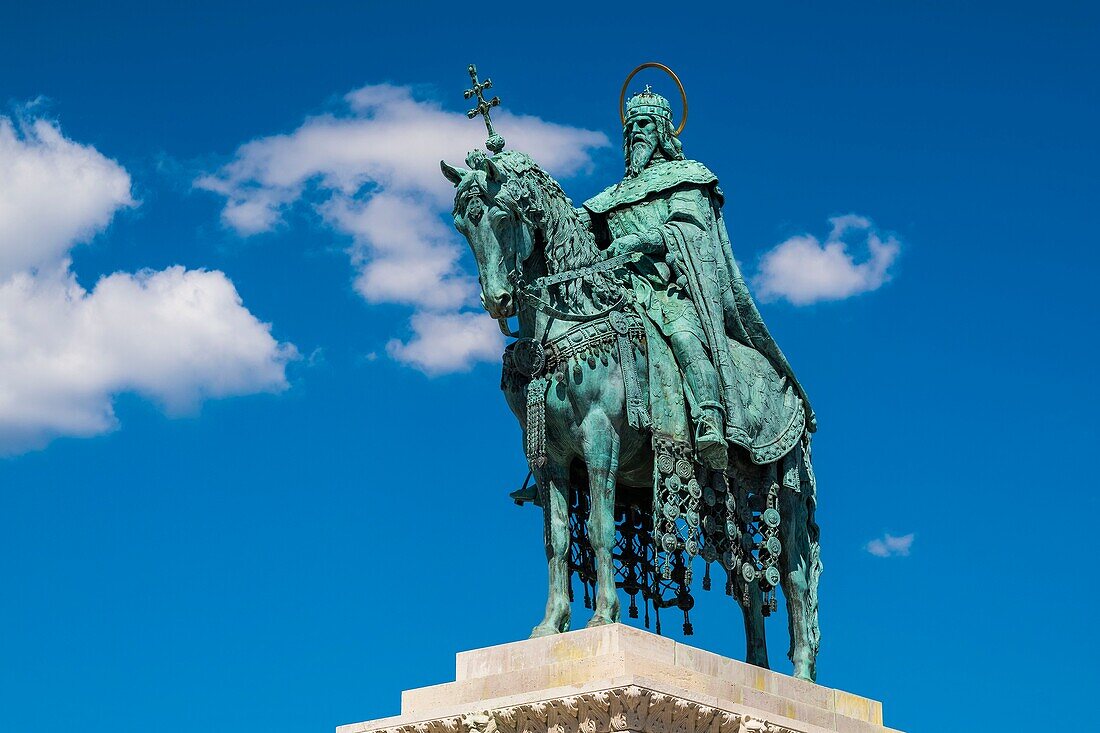 Hungary, Budapest, Buda district, The statue of King St. Stephen I of Hungary. The platform is a work of neo-Romanesque style attributed to Alajos Strobl. It shows events of the life of the king. It was erected in 1906