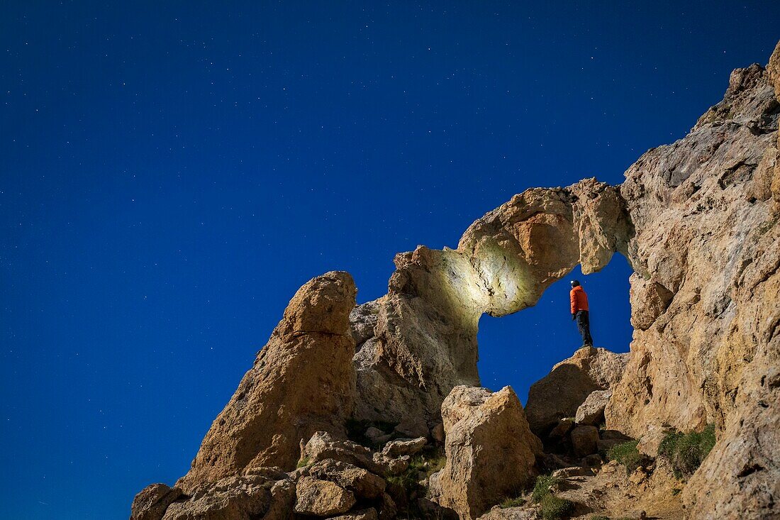 France, Alpes-Maritimes, Mercantour National Park, the Tortisse Arch (2550m) illuminated by the moon