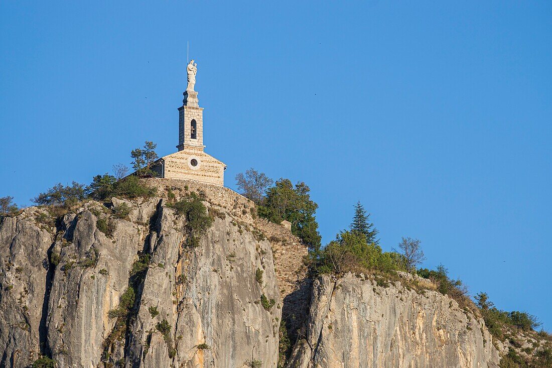 France, Alpes-de-Haute-Provence, Regional Natural Park of Verdon, Castellane, the site of Roc (911m) with at the top the chapel Notre-Dame du Roc