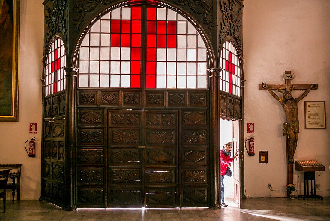 Spain, Canary Islands, La Palma Island, Santa Cruz de la Palma, Plaza Espana, Iglesia del Salvador church, interior, with visitors