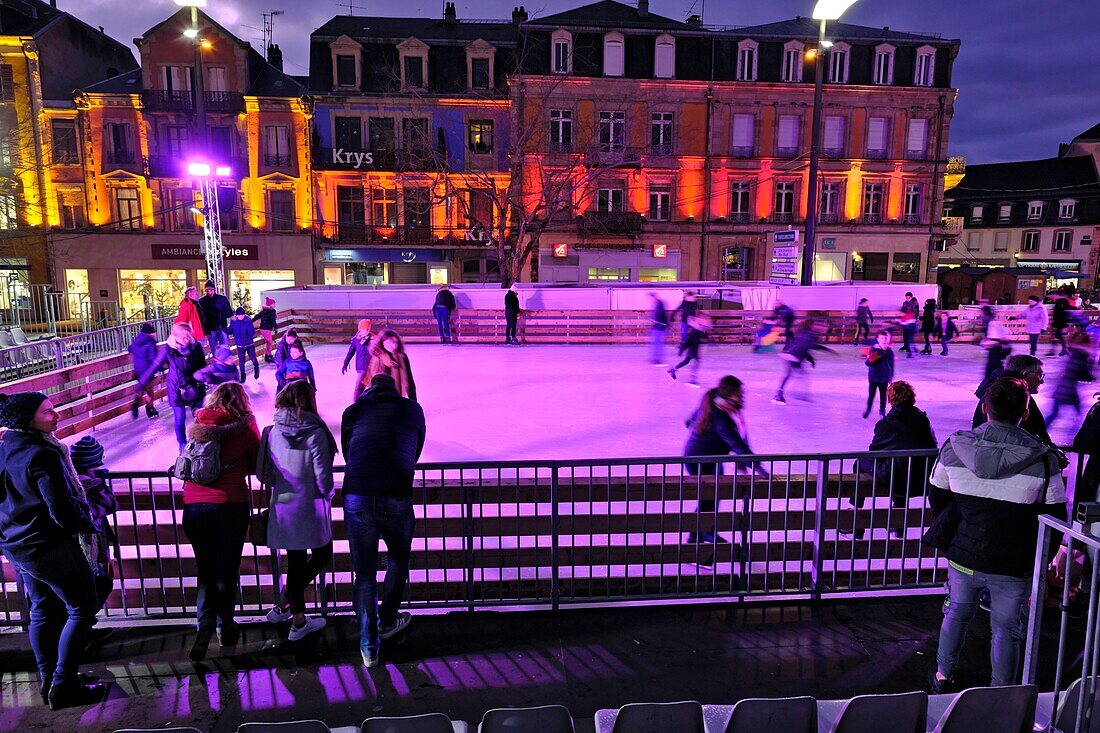 France, Territoire de Belfort, Belfort, Place Corbis ice rink, buildings of the Faubourg de Montbeliard, Christmas animations and lights