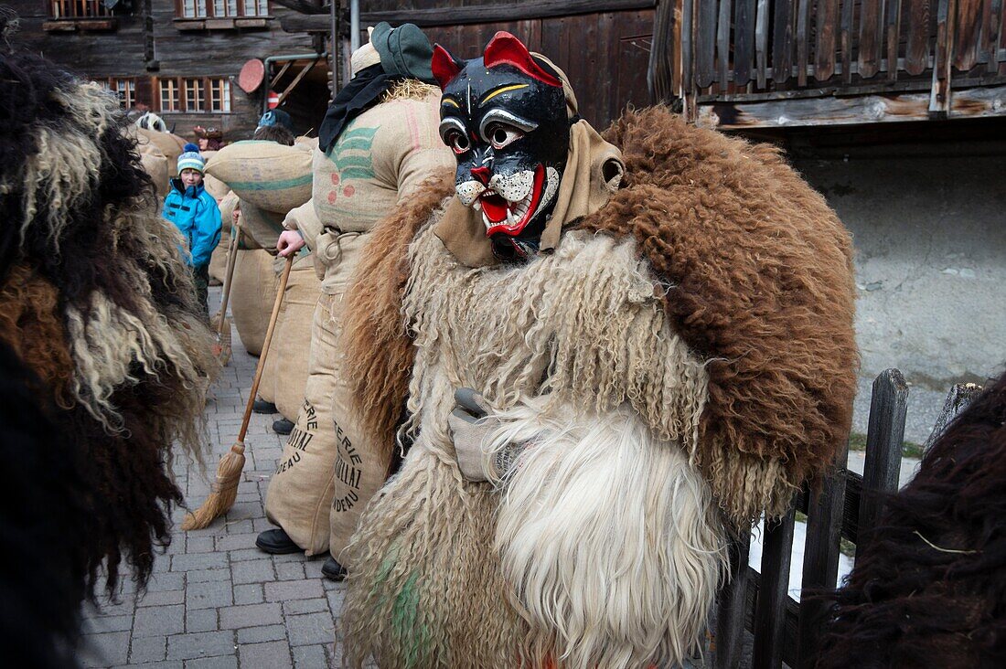 Switzerland, Valais, Evolene valley, Evolene, Carnaval with the Empailles and the Peluches who come from Pagan rites and go around the villages to frighten the bad spirits of winter