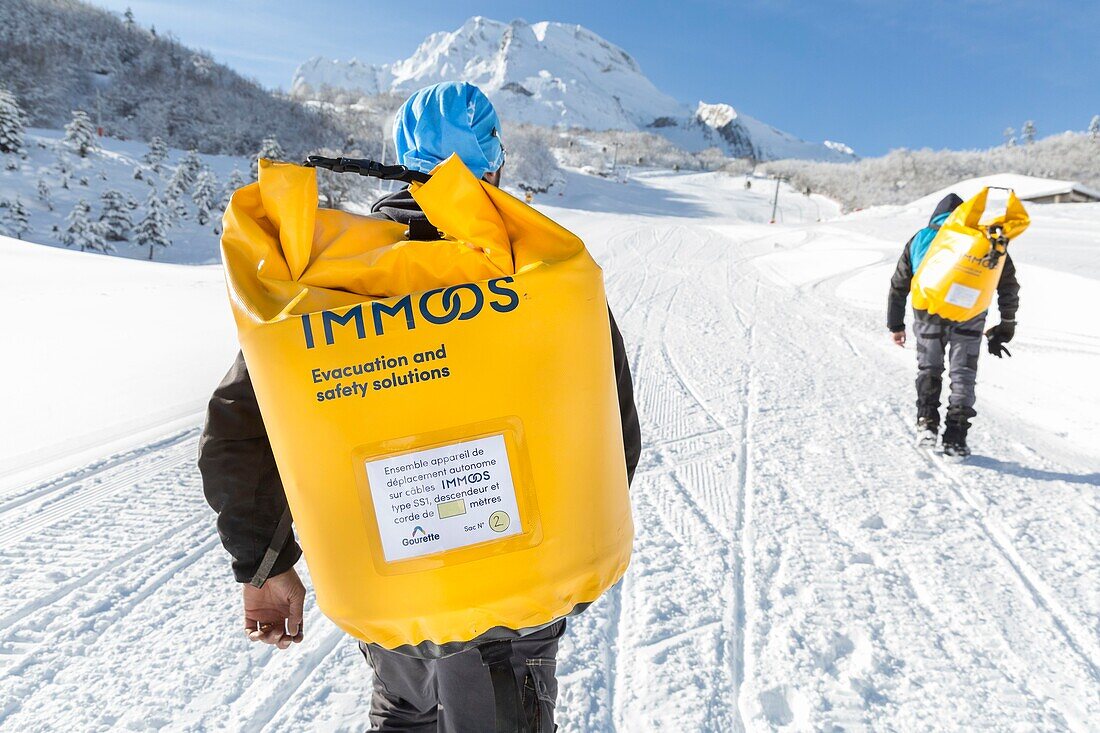 France, Pyrenees Atlantiques, Gourette ski resort (locality of the commune of Eaux-Bonnes), rescue team in case of chairlift blockage