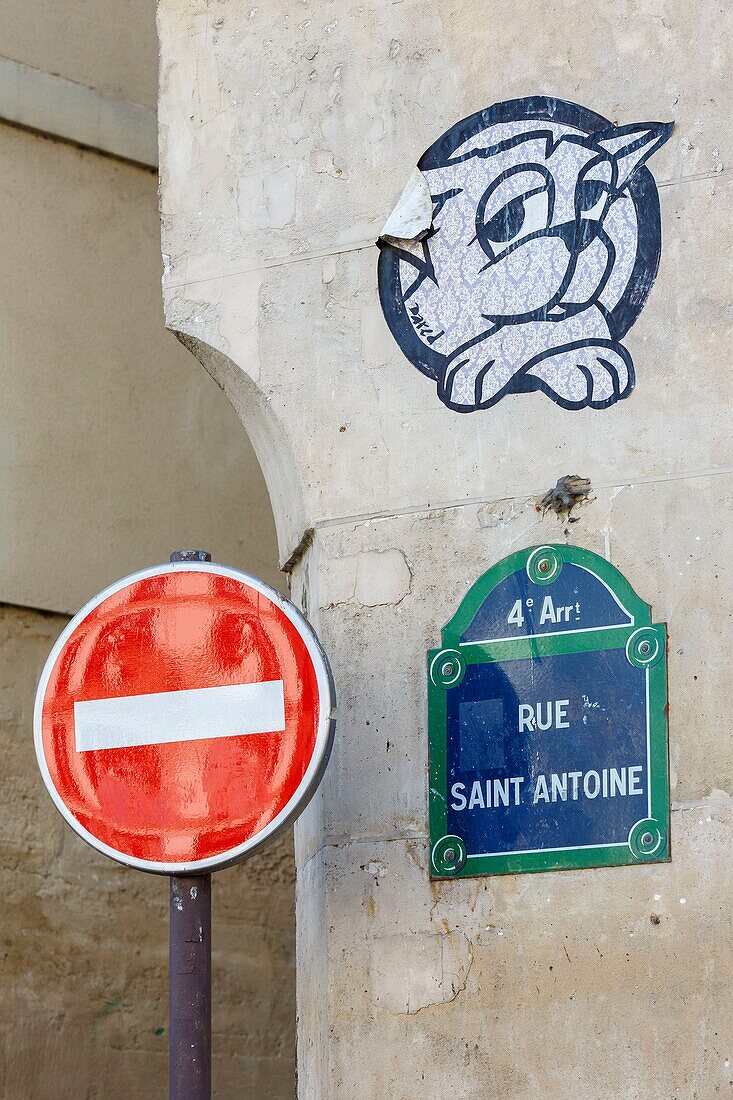 France, Paris, sticker by the artist Dared, street plate and sign