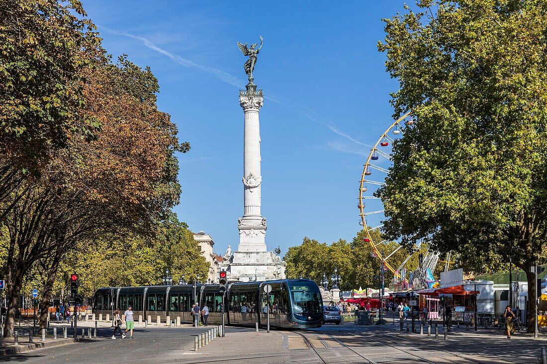 France, Gironde, Bordeaux, area classified as World Heritage by UNESCO, place des Quinconces, monument to the Girondins, also called column of the Girondins, Ferris wheel of the Autumn Pleasure Fair