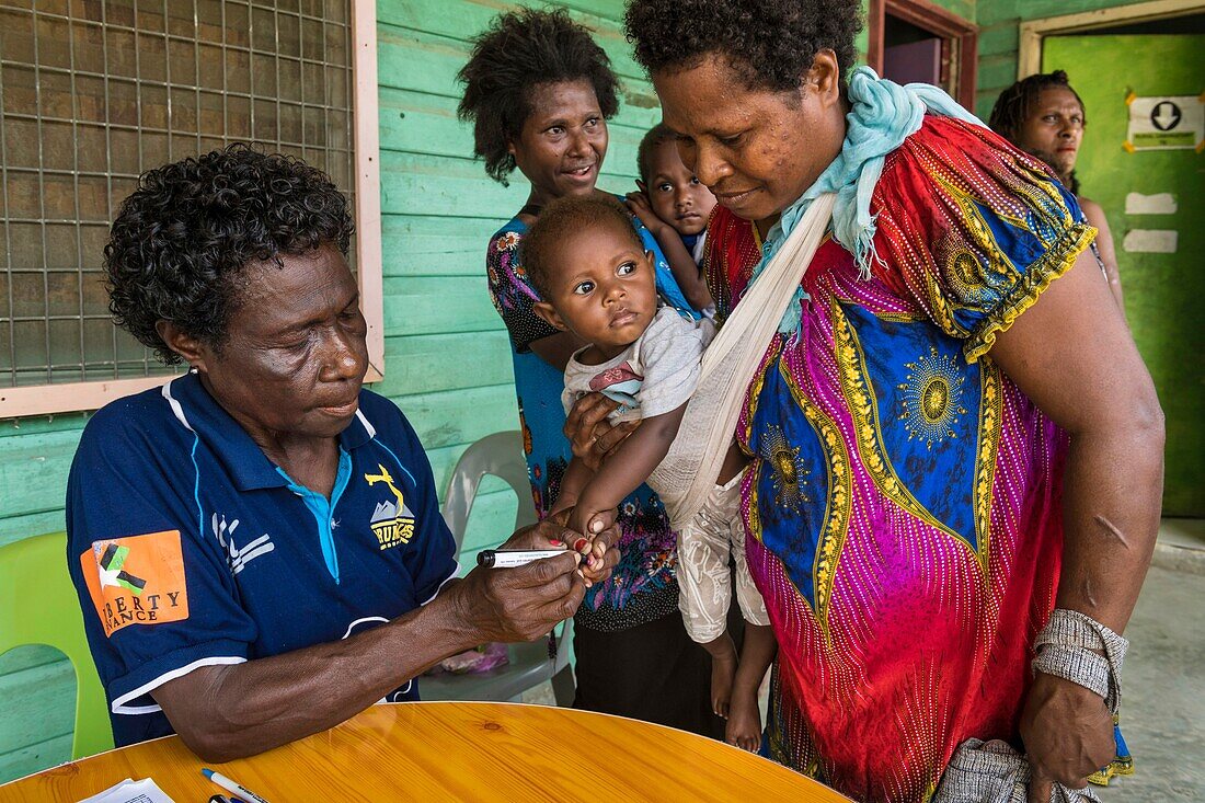 Papua New Guinea, East Sepik Province, Sepik River Region, Wewak City, Poliomyelitis Mass Vaccination during the 2019 Epidemic Eradication Campaign, marking of the children vaccinated