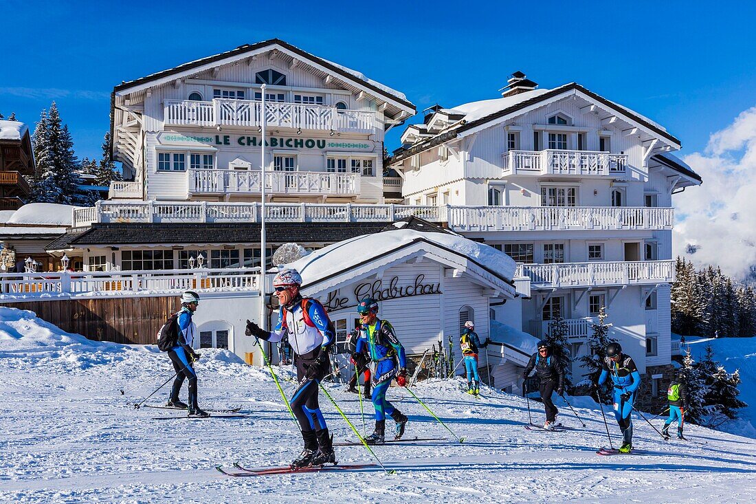 France, Savoie, Courchevel 1850, ski mountaineering race in front of Le Chabichou, five-star hotel and two-star restaurant, Vanoise massif, Tarentaise valley