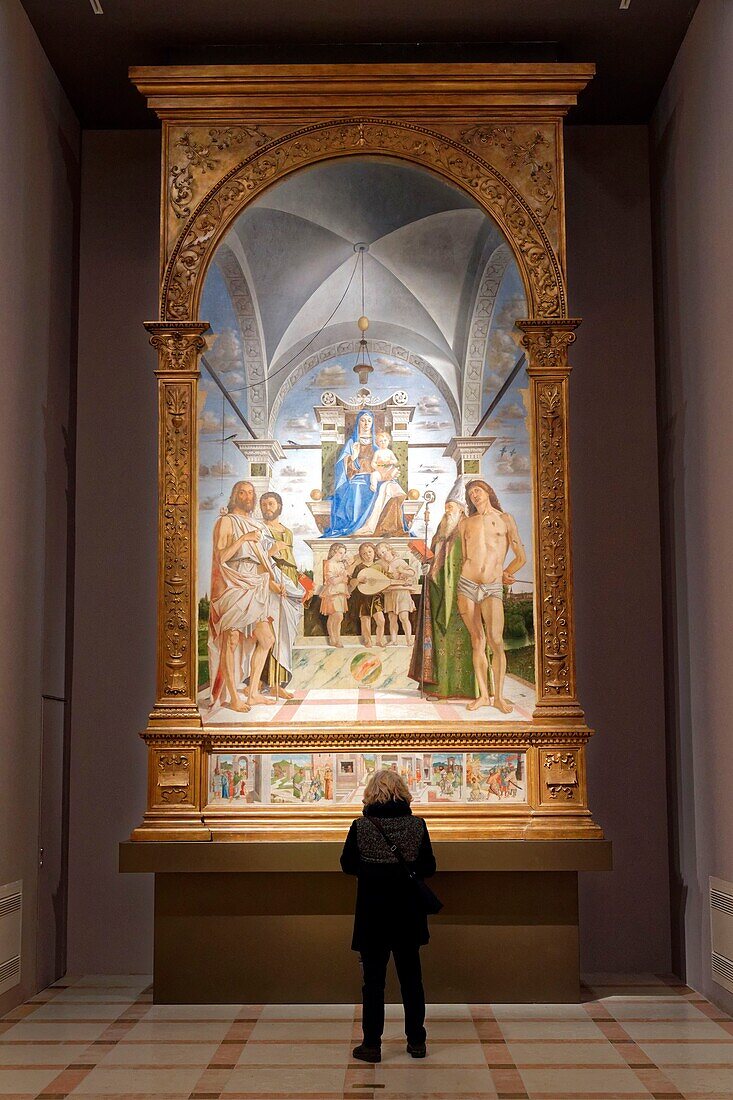 Italy, Veneto, Vicenza, Piazza Matteotti, Museo civico di Palazzo Chiericati built in 1551 by Palladio, listed as World Heritage by UNESCO, Mandonna on the throne with her child among the saints John the Baptist, Bartholomew, Augustine and Sebastian and three playing angels of Bartolomeo Montagna