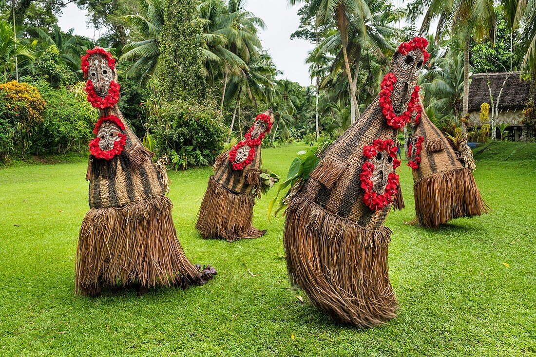 Papua New Guinea, East Sepik Province, Sepik River Region, Kanganamun Village, dancing masks inf front of House of Spirits (Haustambaran) named Walimbi