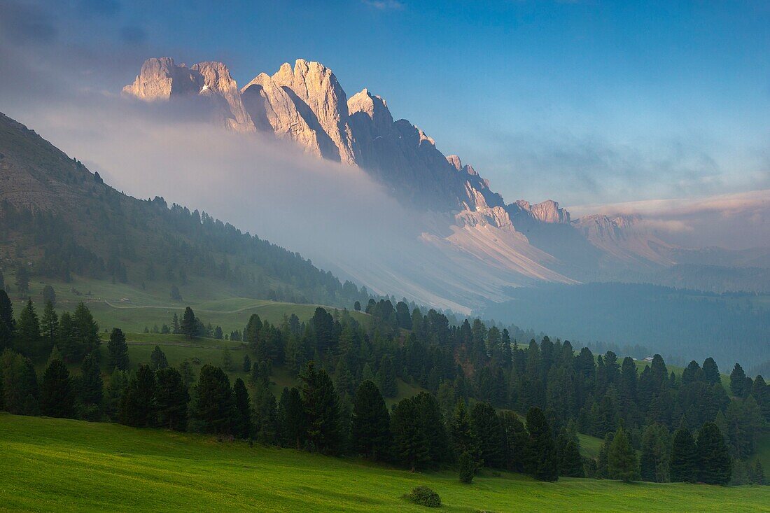 Italy, Trentino-Alto Adige, South Tyrol, Val di Funes, Dolomites massif classified as World Heritage by UNESCO, the typical huts of the Puez Odle park (Puez Geisler)