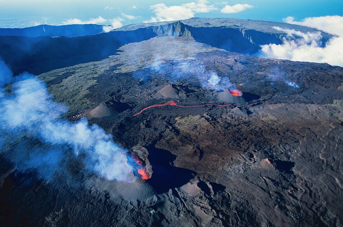 France, Reunion Island, Piton Volcano of la Fournaise erupting from the sky (aerial view)