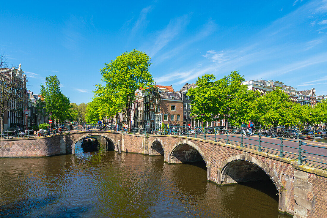 Bridges at intersection of Keizersgracht and Reguliersgracht canals, Amsterdam, The Netherlands, Europe