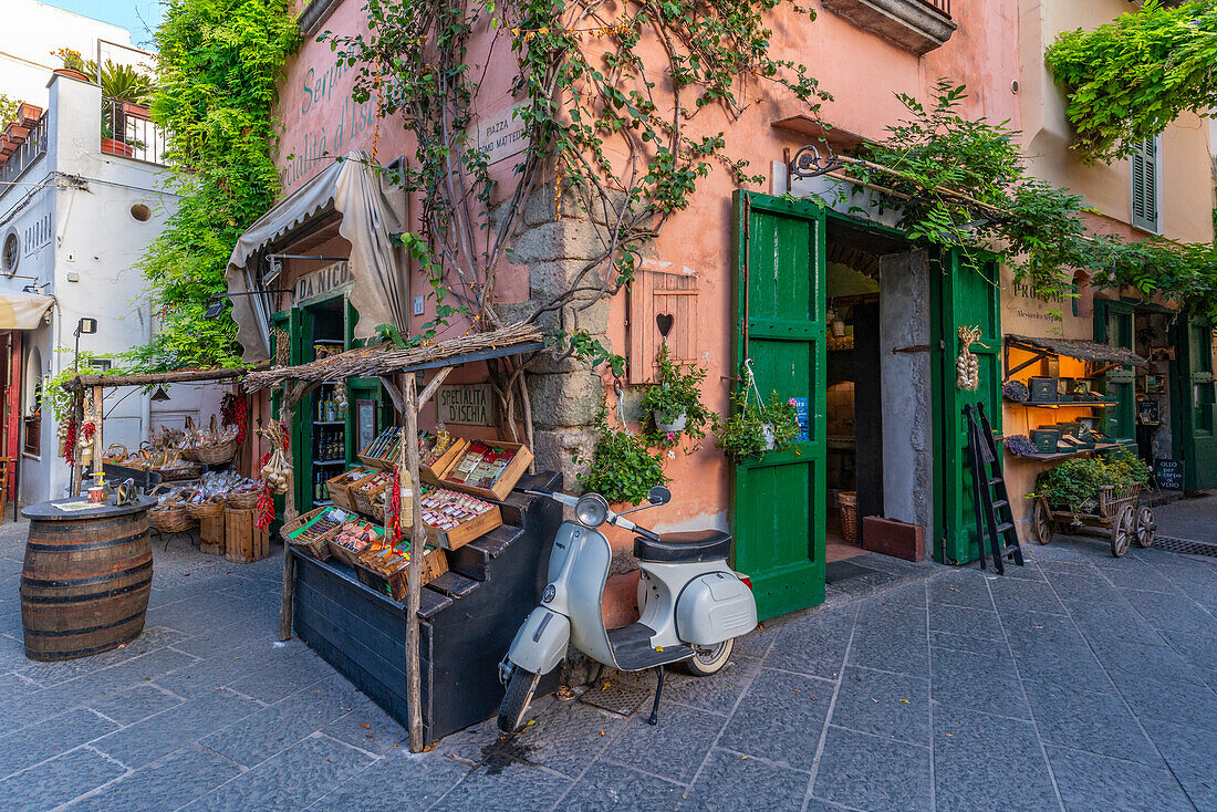 View of scooter outside shop in Piazza Giacomo Matteotti, Forio, Island of Ischia, Campania, Italy, Europe