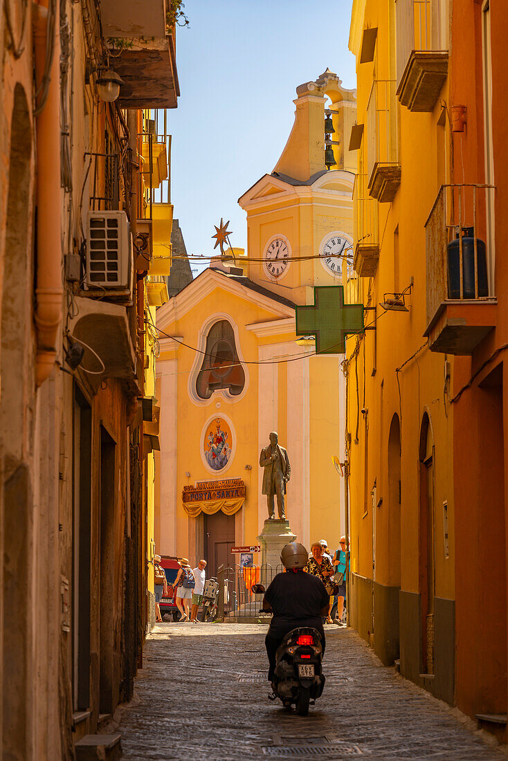 View of colourful narrow backstreet and Church of Santa Maria delle Grazie, Procida, Phlegraean Islands, Gulf of Naples, Campania, Southern Italy, Italy, Europe