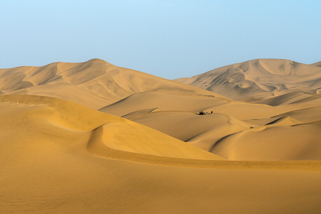 Dune buggy on sand dunes in desert, Huacachina, Ica District, Ica Province, Ica Region, Peru, South America