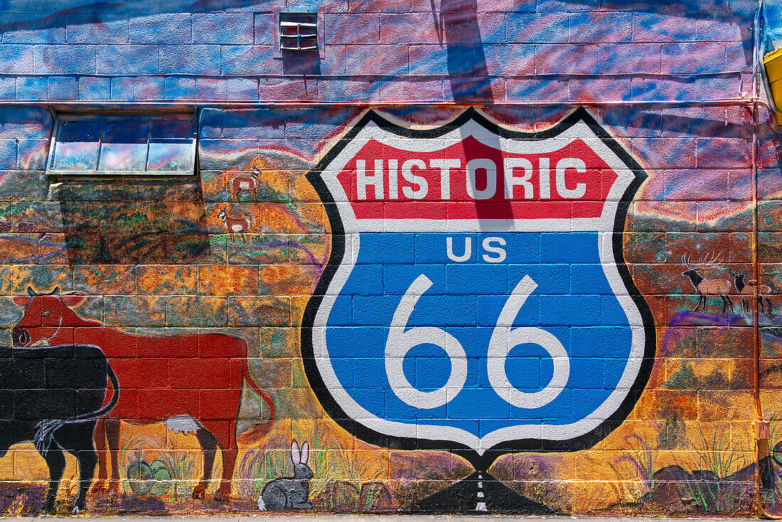 Painted Route 66 sign on wall, Seligman, Arizona, United States of America, North America