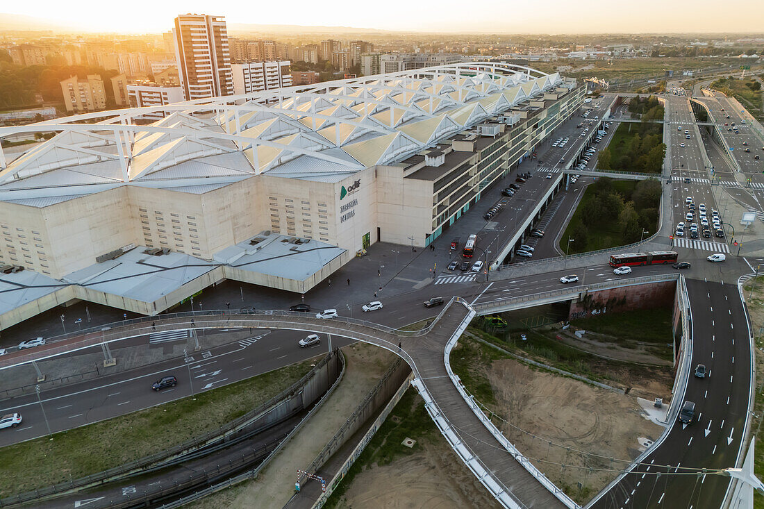 Aerial view of Zaragoza–Delicias railway and central bus station at sunset