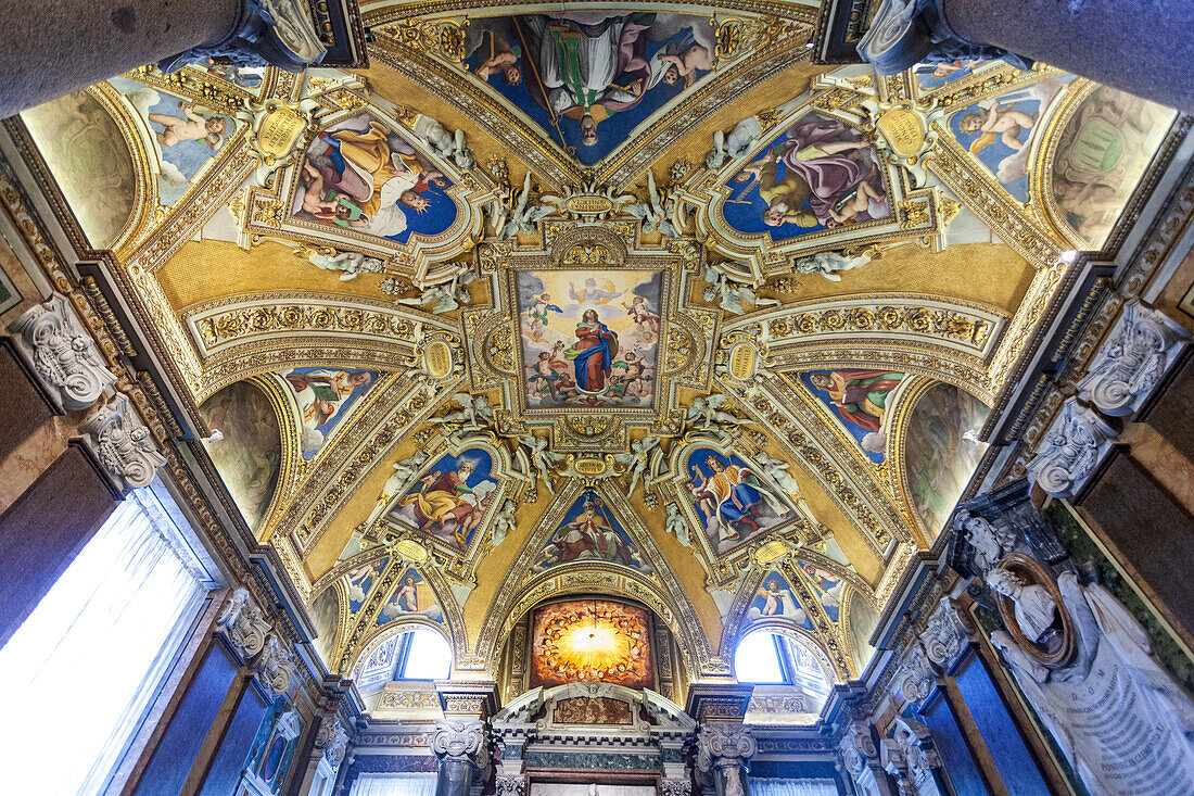 Rome, Italy, July 22 2017, Intricate frescoes depicting religious figures on the baptistery ceiling in Rome, Italy.