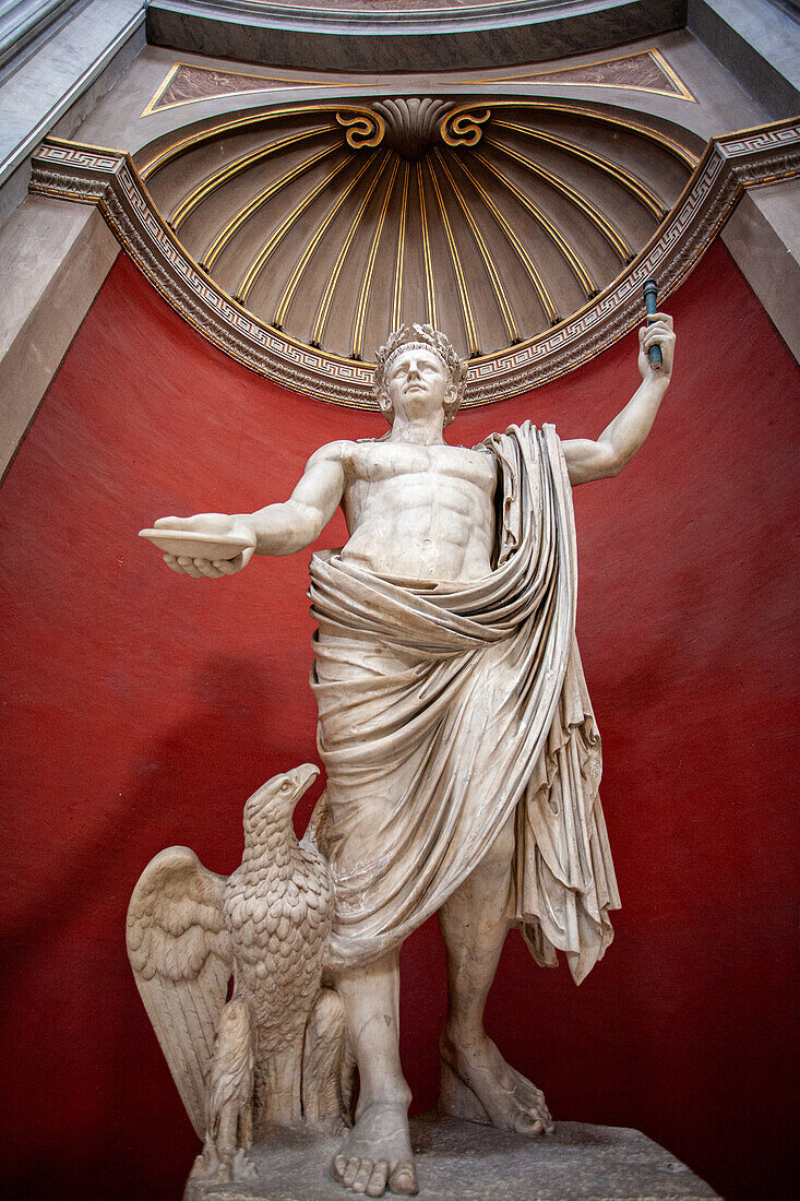 Rome, Italy, July 22 2017, A statue of Emperor Claudius as Iuppiter stands proudly in the Vatican Museums, showcasing ancient artistry and Roman culture.