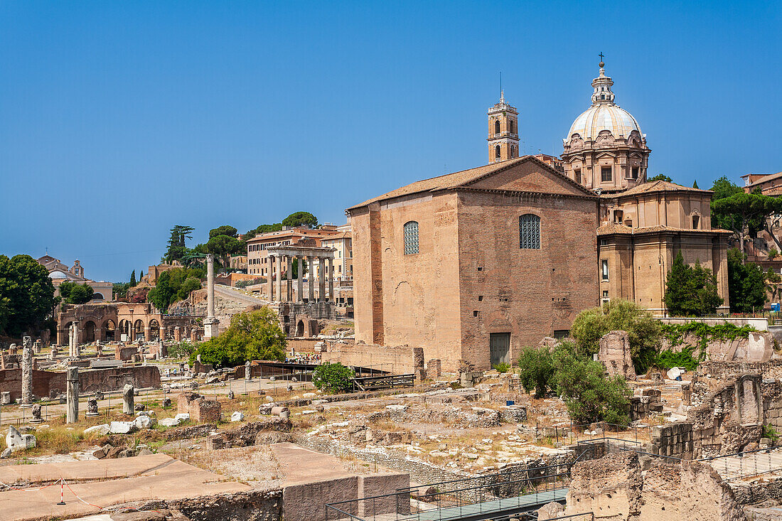 Scenic view of Curia Julia and ancient Roman ruins in Rome, Italy.