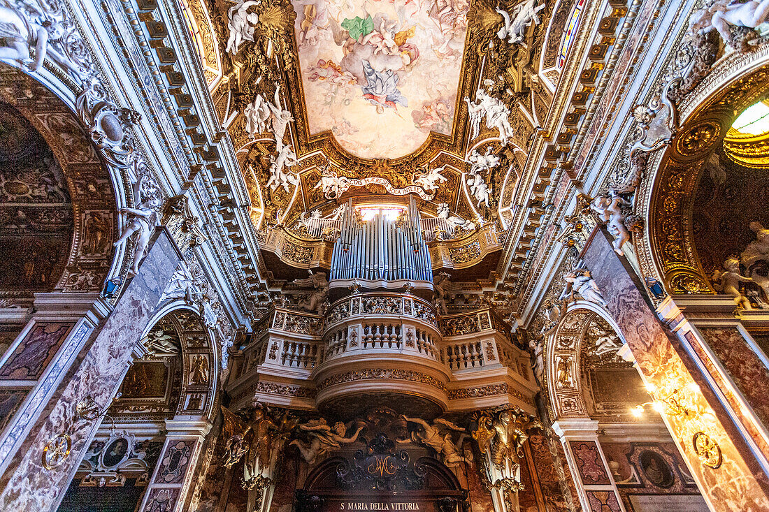 Rome, Italy, July 22 2017, Explore the ornate ceiling and captivating entrance of Santa Maria della Vittoria in Rome, showcasing its stunning Baroque architecture.