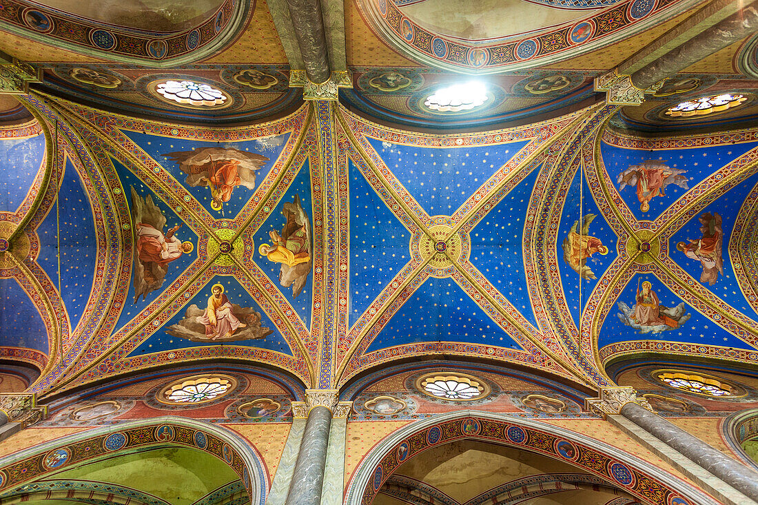 Rome, Italy, July 2017, The beautifully painted ceiling features intricate designs and historic figures in Santa Maria Sopra Minerva Basilica.