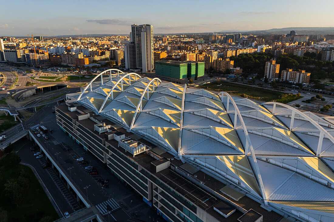 Aerial view of Zaragoza–Delicias railway and central bus station at sunset