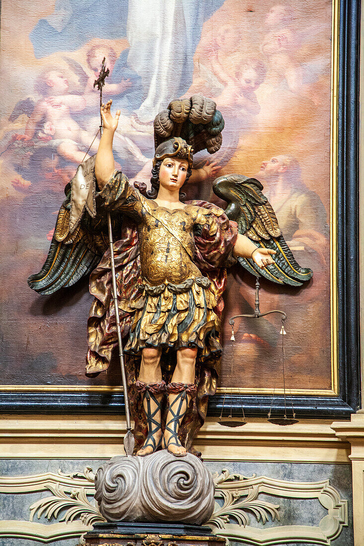 Lisbon, Portugal, March 1 2007, The intricate carving of Archangel Saint Michael stands majestically inside the Encarnaçao Church, showcasing exquisite artistry.