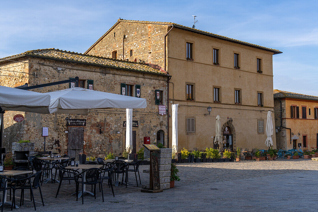 The Piazza Roma in the medieval walled town of Monteriggioni, Sienna Province, Italy.