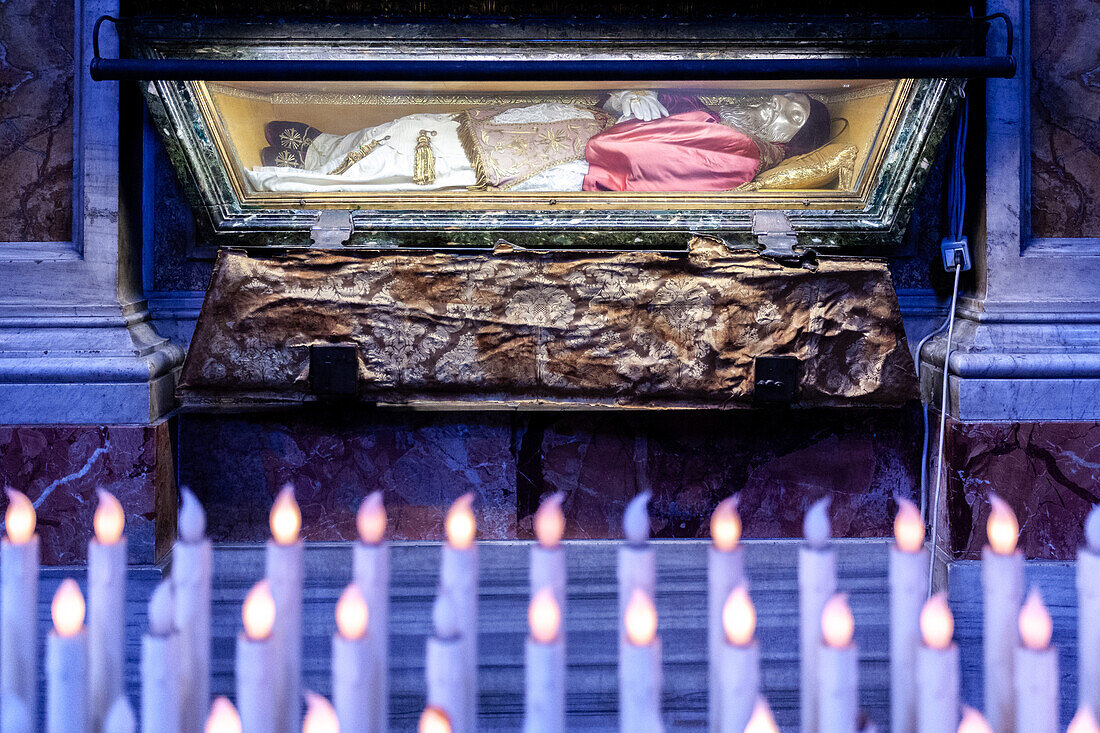 Rome, Italy, July 22 2017, Visitors honor Saint Pius V as they observe his preserved body in Santa Maria Maggiore basilica, Rome, Italy.