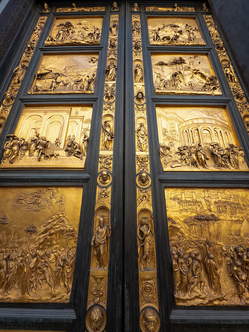 Biblical scenes on the Gates of Paradise or East Doors of Saint John's Baptistery in Florence, Italy.