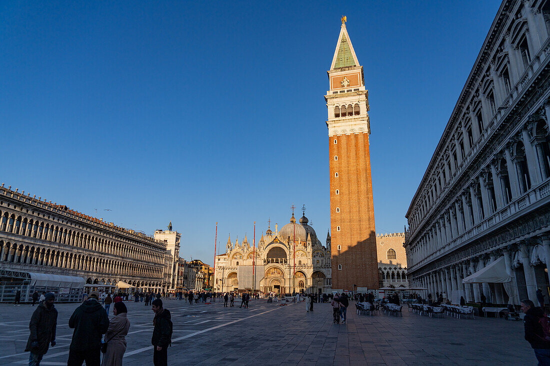 St. Mark's Basilica & campanile on St. Mark's Square in Venice, Italy. At left is the Procuratie Vecchie with the Procuratie Nuove at right.