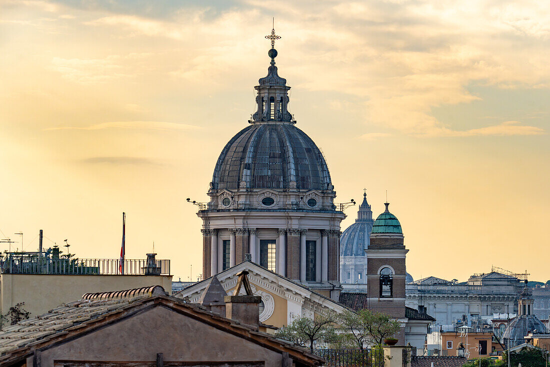 Dome of the Basilica di Santi Ambrogio e Carlo with St. Peter's Basilica behind in Rome, Italy. Taken from the top of the Spanish Steps.