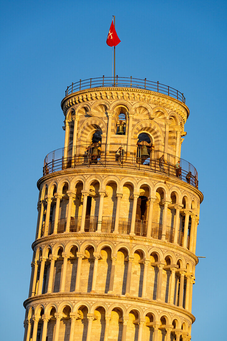 Tourists on the observation platform of the Leaning Tower of Pisa. Pisa, Italy.