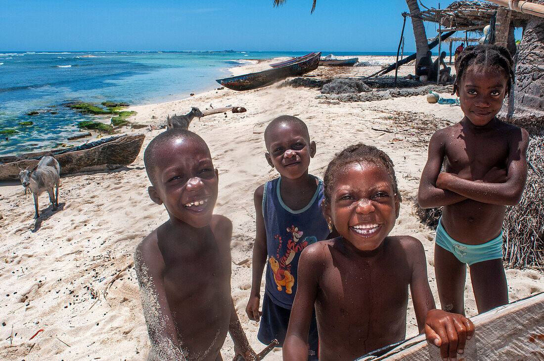 Children playing in the beach on Cayes-à-L’eau, a fishermen islet located northeast of Caye Grand Gosie, Île-à-Vache, Sud Province, Haiti