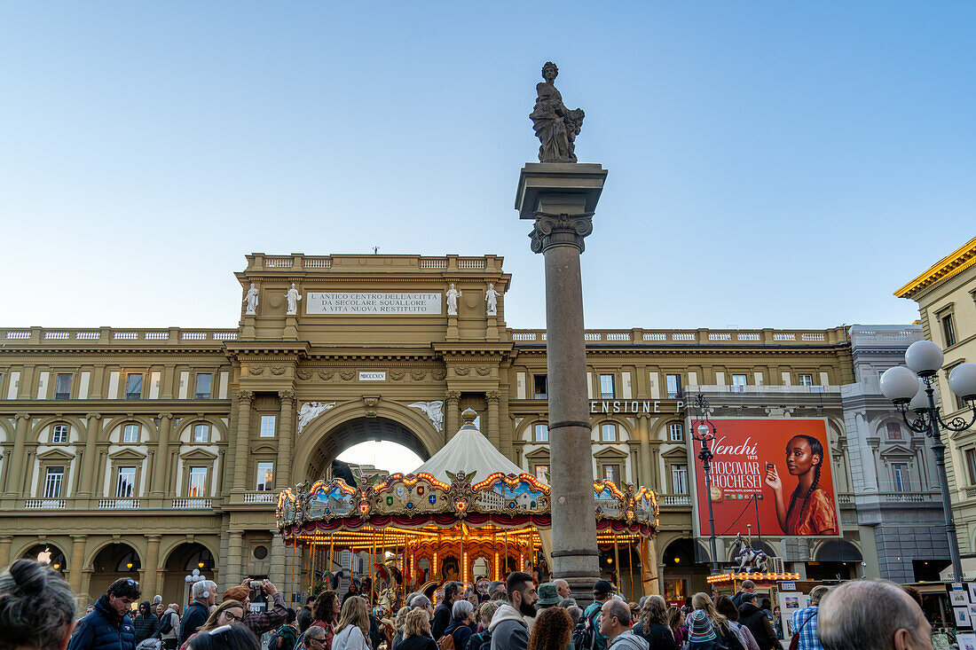 The Column of Abundance in the Piazza della Repubblica or Republic Square in Florence, Italy. Behind is the Palazzo dell'Arcone di Piazza.