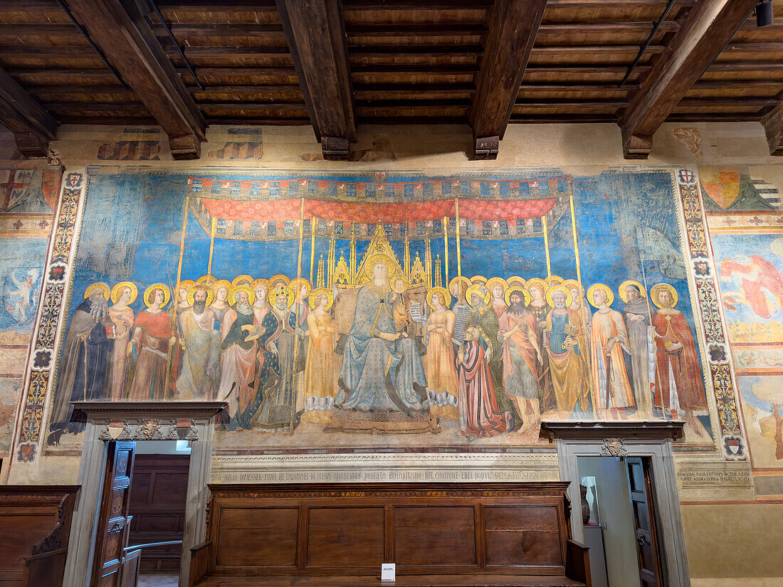 Lippo Memmi's Maesta in the Sala di Dante of the 13th Century Palazzo Comunale or city hall in San Gimignano, Italy.