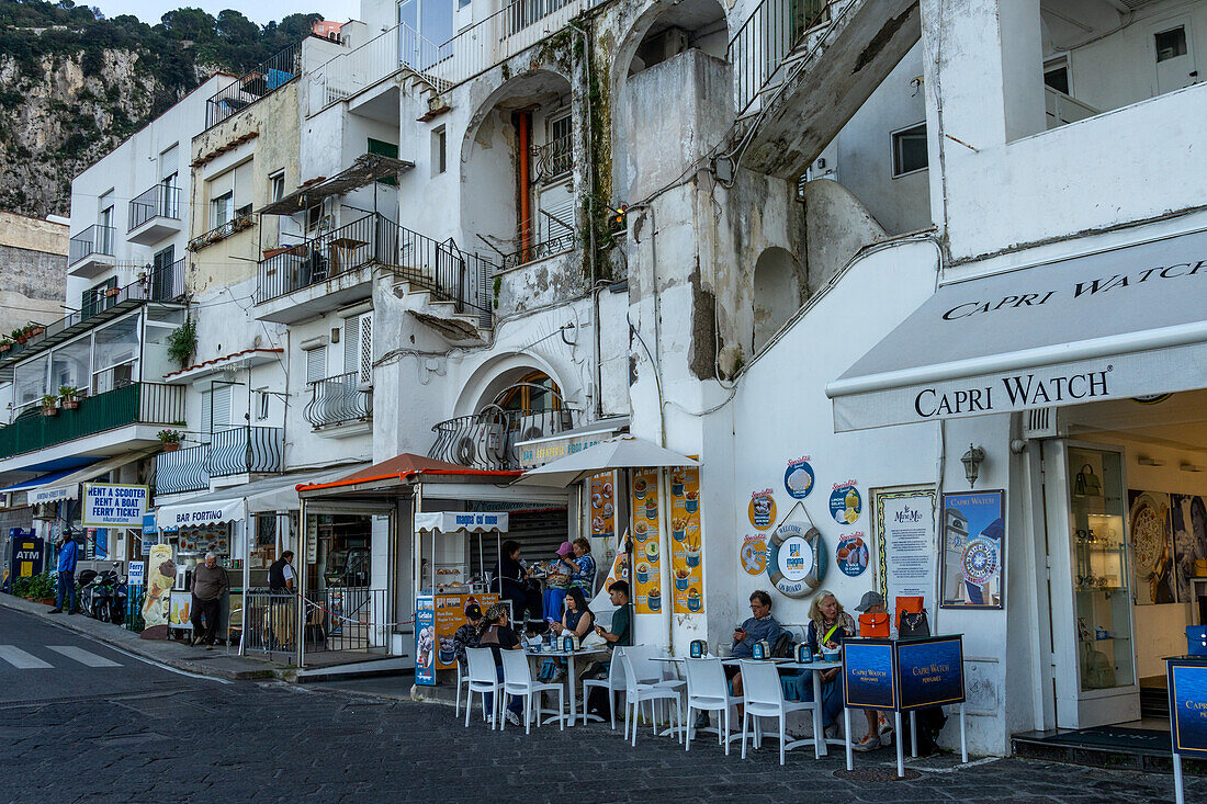 Tourists and shops on the waterfront street of Marina Grande on the island of Capri, Italy.