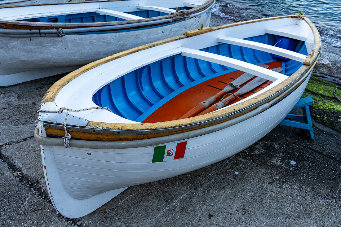 Wooden rowboats hauled out on the ramp in the Marina Grande harbor on the island of Capri, Italy.