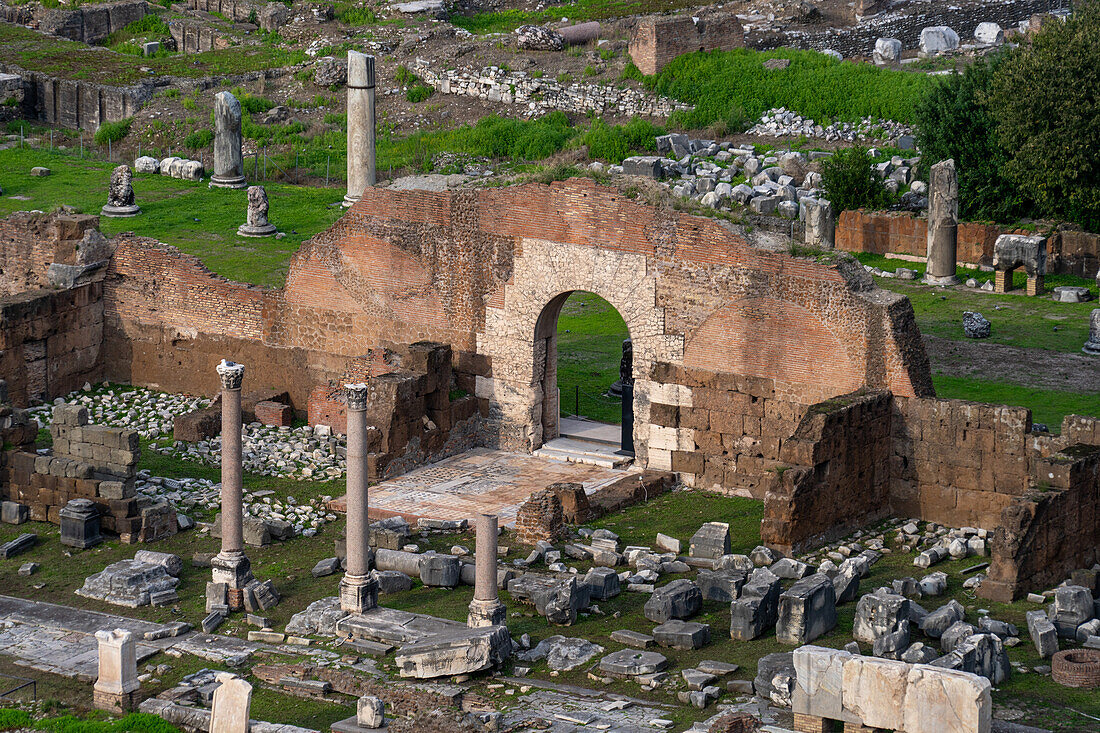 Ruins of the Basilica Aemilia in the Roman Forum in the Colosseum Archaeological Park in Rome, Italy.