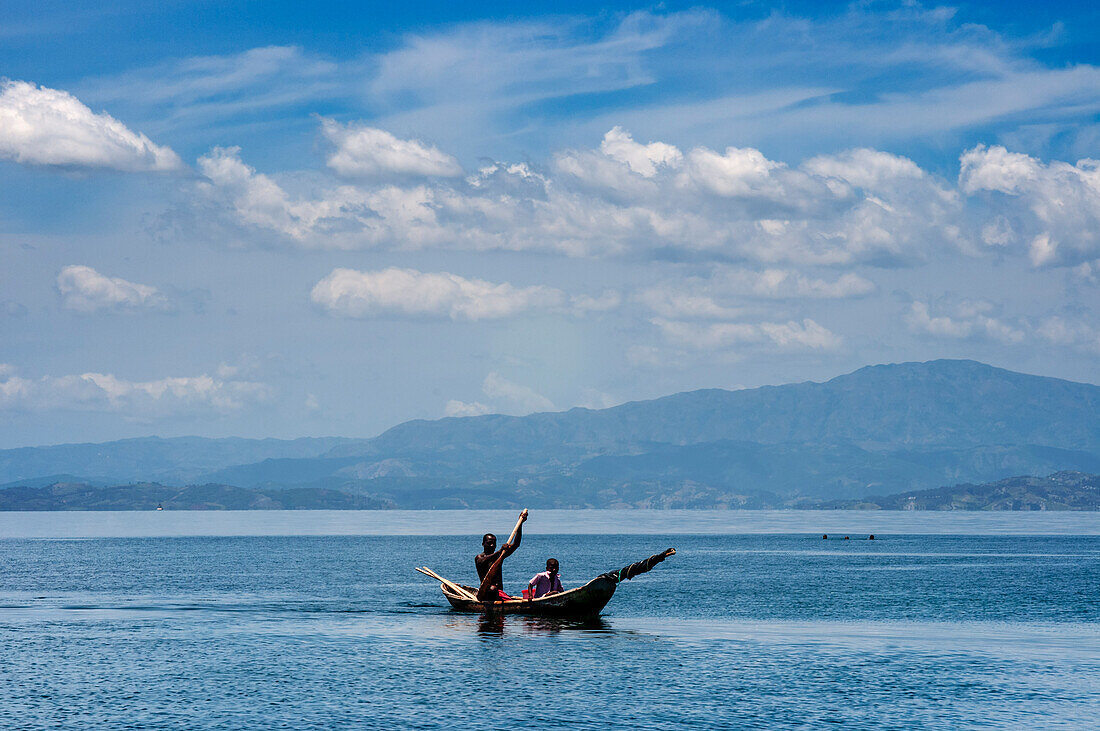 Fishermen in the waterfront beach in Île-à-Vache, Sud Province, Haiti