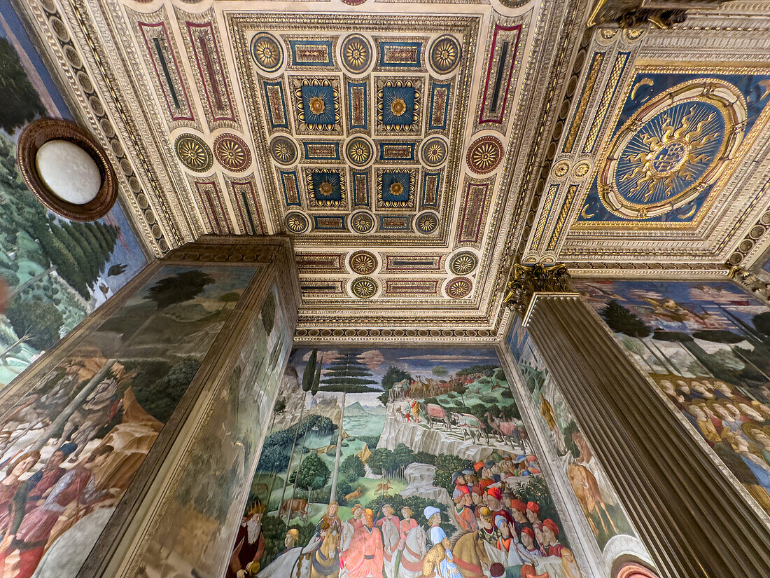 Ornate carved and gilded ceiling in the Magi Chapel in the Palazzo Medici Riccardi in Florence, Italy.