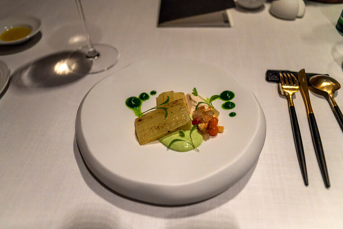 Chard, cashew and fresh almond dish in the Sukaldean Restaurant of Aitor Santamaria renowned Michelin starry chef in San Sebastian Donostia Historic centre. Guipuzcoa. Basque Country. Spain. Europe