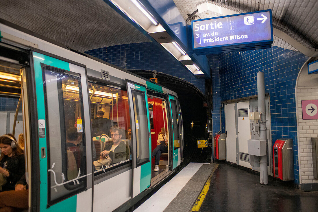 People getting off the Paris Metro underground train at Alma Marceau station Montmartre Paris France EU Europe