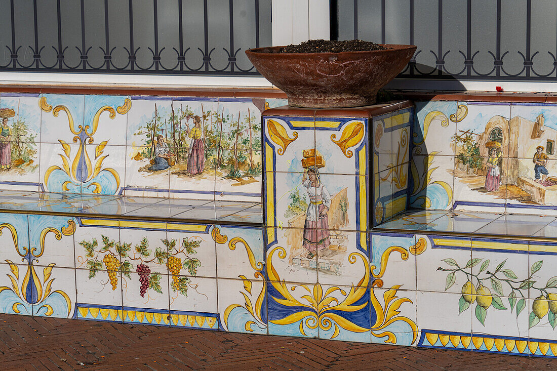 A colorful ceramic bench with a lemon motif in the resort town of Anacapri on the island of Capri, Italy.