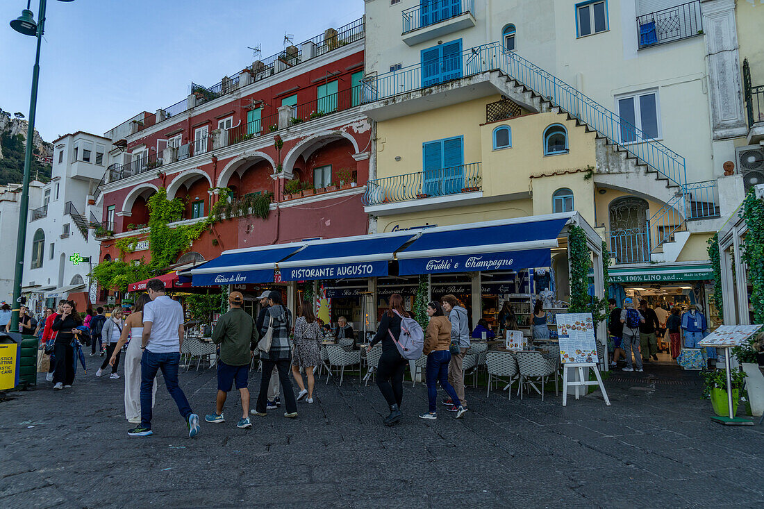 Tourists and shops on the waterfront street of Marina Grande on the island of Capri, Italy.