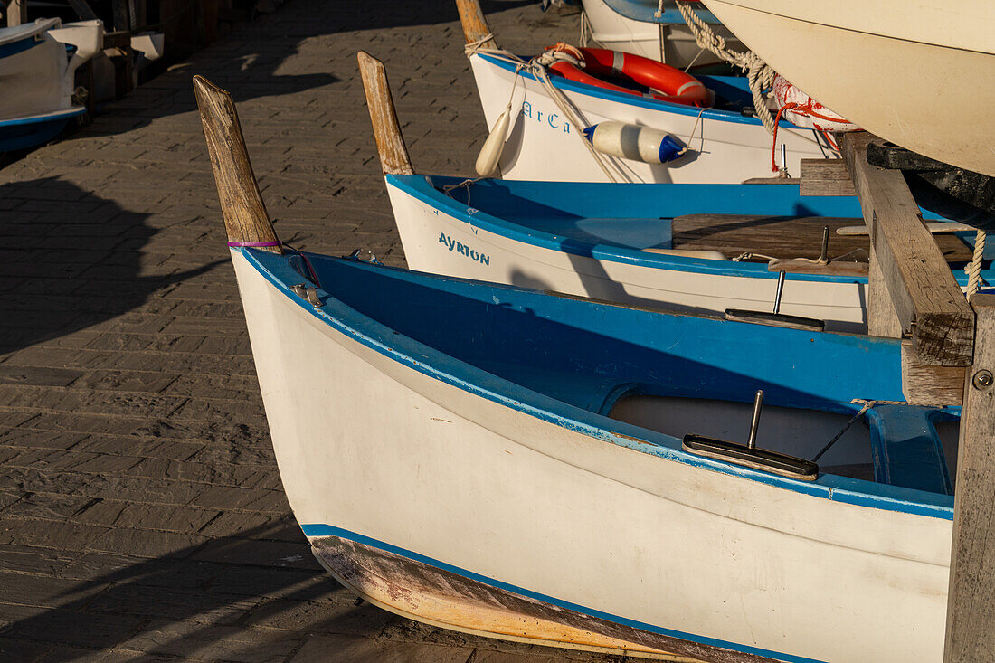 Boats out of the water by the harbor in Riomaggiore, Cinque Terre, Italy.