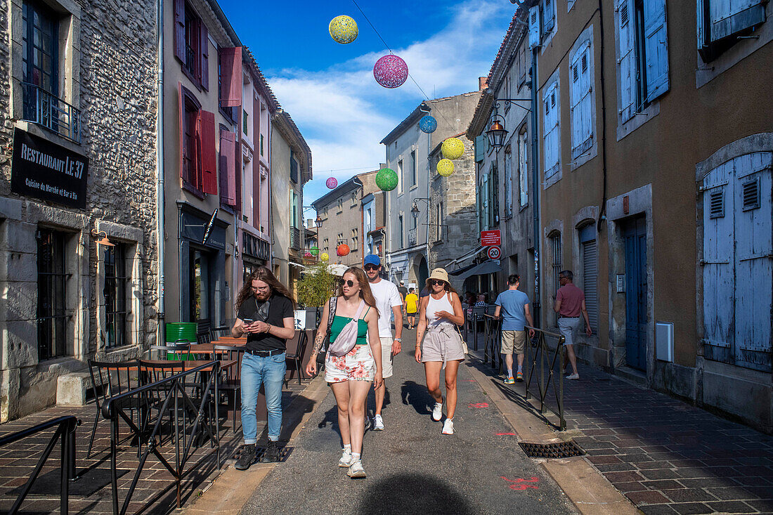 Main shopping streets in the middle of medieval walled city Cite of Carcassonne, Languedoc, France